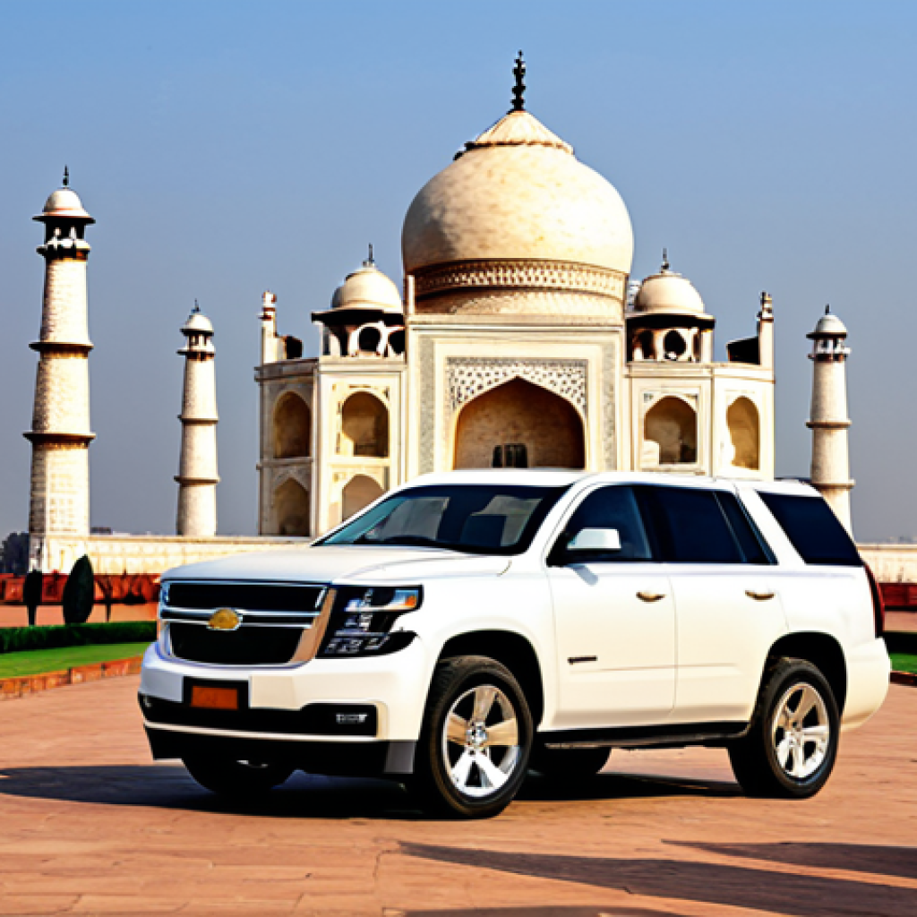 쉐보레 타호와 포드 익스페디션 비교 - Chevrolet Tahoe**
"A rugged, yet stylish Chevrolet Tahoe parked in front of the Taj Mahal, India. T...