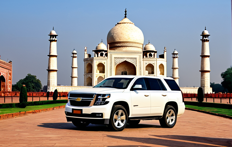 쉐보레 타호와 포드 익스페디션 비교 - Chevrolet Tahoe**
"A rugged, yet stylish Chevrolet Tahoe parked in front of the Taj Mahal, India. T...